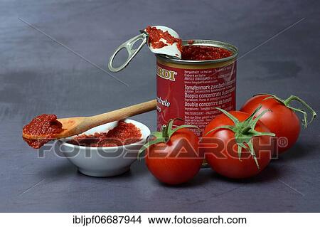 Tomato paste in can and skin, tomatoes, Germany, Europe View Large Photo Image Picture - Tomato paste in can and skin, tomatoes, Germany, Europe. Fotosearch