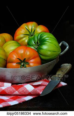 Tomatoes in bowl, Emilia-Romagna, variety Costoluto di Parma, Italy, Europe View Large Photo Image Picture - Tomatoes in bowl, Emilia-Romagna, variety Costoluto di Parma, Italy, Europe. Fotosearch