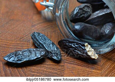 Stock Image - Tonka beans ( Dipteryx odorata). Fotosearch