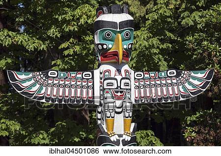 Stock Photograph - Totem Pole in Stanley Park, Vancouver, British Columbia Province, Canada, North America. Fotosearch