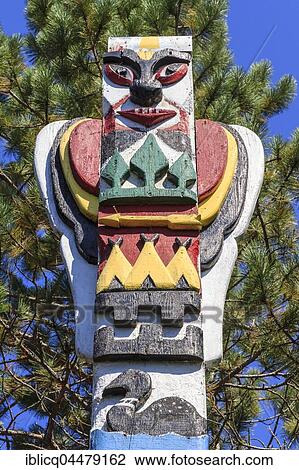 Stock Image - Totem pole, memorial for artist Tom Thomson, Canoe Lake, Algonquin Provincial Park, Ontario Province, Canada, North America. Fotosearch