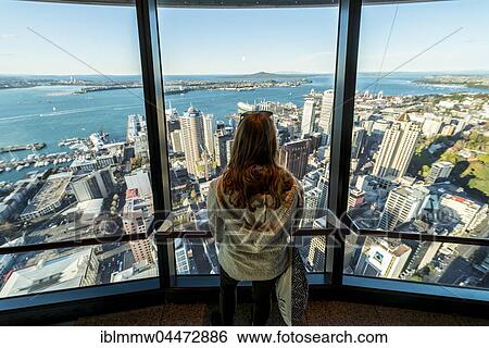 Tourist enjoying the view from the observation deck of the Sky Tower, skyline with skyscrapers, Central Business District, Auckland Region, North Island, New Zealand, Oceania View Large Photo Image Stock Photograph - Tourist enjoying the view from the observation deck of the Sky Tower, skyline with skyscrapers, Central Business District, Auckland Region, North Island, New Zealand, Oceania. Fotosearch