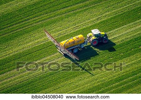 Tractor with pesticide sprayer on meadow, fertilizing, Dorsten, Ruhr district, North Rhine-Westphalia, Germany, Europe View Large Photo Image Stock Image - Tractor with pesticide sprayer on meadow, fertilizing, Dorsten, Ruhr district, North Rhine-Westphalia, Germany, Europe. Fotosearch