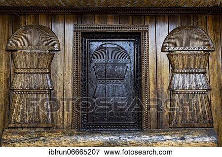 Traditional artist woodwork in the Naga heritage village Kisama, Nagaland, India, Asia View Large Photo Image Stock Photo - Traditional artist woodwork in the Naga heritage village Kisama, Nagaland, India, Asia. Fotosearch