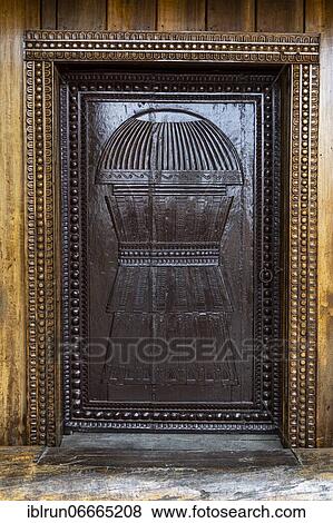 Stock Photo - Traditional artist woodwork in the Naga heritage village Kisama, Nagaland, India, Asia. Fotosearch