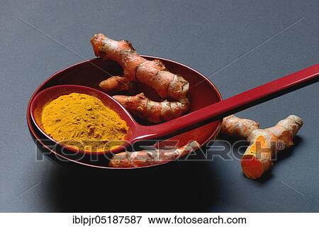 Stock Photo - Turmeric powder and turmeric root, curcuma longa, turmeric root, turmeric powder. Fotosearch