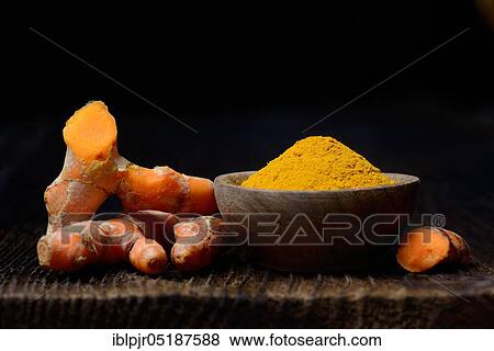 Turmeric powder and turmeric root, curcuma longa, turmeric root, turmeric powder View Large Photo Image Stock Photo - Turmeric powder and turmeric root, curcuma longa, turmeric root, turmeric powder. Fotosearch