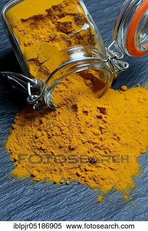 Turmericpowder ( Curcuma longa) with glass vessel View Large Photo Image Stock Photography - Turmericpowder ( Curcuma longa) with glass vessel. Fotosearch