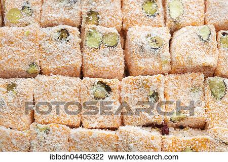Typical Turkish delights with orange, on display at the Grand Bazaar, Istanbul, Turkey, Asia View Large Photo Image Stock Image - Typical Turkish delights with orange, on display at the Grand Bazaar, Istanbul, Turkey, Asia. Fotosearch
