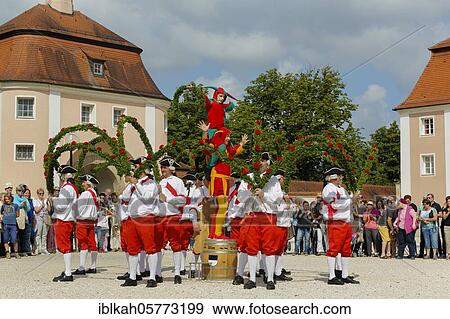 Ulmer Bindertanz with fools in the monastery courtyard in Waiblingen, Ulm, Baden-Württemberg, Germany, Europe View Large Photo Image Stock Photo - Ulmer Bindertanz with fools in the monastery courtyard in Waiblingen, Ulm, Baden-Württemberg, Germany, Europe. Fotosearch