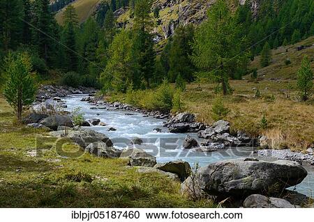 Stock Image - Val Roseg with river Ova da Roseg, Pontresina, Engadin, Canton Grisons, Switzerland, Europe. Fotosearch
