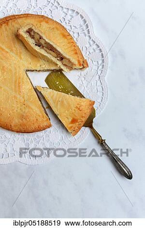 Stock Photo - Valais nut cake with cake shovel. Fotosearch