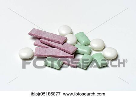 Stock Photo - Various chewing gums, chewing gum lozenges, dragees, chewing gum strips. Fotosearch