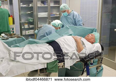Vascular surgery, surgery on the hand with local anesthesia, operating room in the hospital, Düsseldorf, North Rhine-Westphalia, Germany, Europe View Large Photo Image Stock Image - Vascular surgery, surgery on the hand with local anesthesia, operating room in the hospital, Düsseldorf, North Rhine-Westphalia, Germany, Europe. Fotosearch
