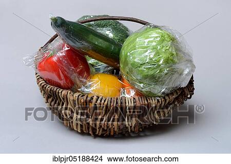 Vegetables in plastic packaging, cucumber View Large Photo Image Picture - Vegetables in plastic packaging, cucumber. Fotosearch
