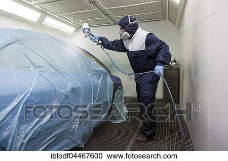Vehicle painter during a partial painting of a car in the spray booth, Düsseldorf, North Rhine-Westphalia, Germany, Europe View Large Photo Image Stock Image - Vehicle painter during a partial painting of a car in the spray booth, Düsseldorf, North Rhine-Westphalia, Germany, Europe. Fotosearch