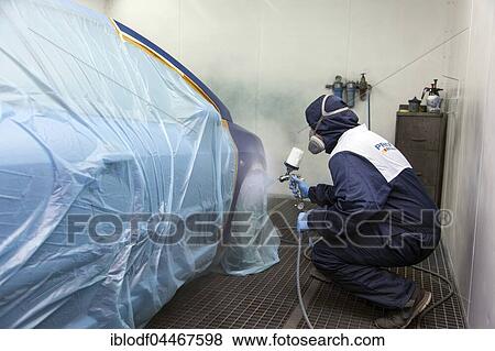 Vehicle painter on car, part painting in the spray booth, Düsseldorf, North Rhine-Westphalia, Germany, Europe View Large Photo Image Stock Photo - Vehicle painter on car, part painting in the spray booth, Düsseldorf, North Rhine-Westphalia, Germany, Europe. Fotosearch