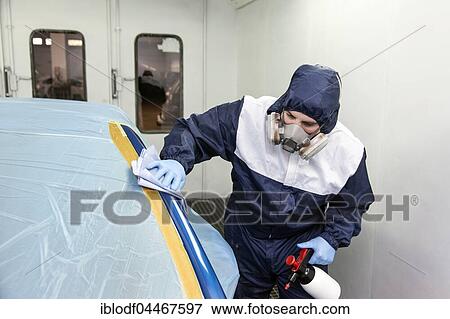 Vehicle painter prepares a partial paint, degreasing the parts to be painted on the car, Düsseldorf, North Rhine-Westphalia, Germany, Europe View Large Photo Image Stock Photo - Vehicle painter prepares a partial paint, degreasing the parts to be painted on the car, Düsseldorf, North Rhine-Westphalia, Germany, Europe. Fotosearch