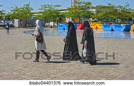 Veiled Arab women, Messestadt-West, Munich, Bavaria, Germany, Europe View Large Photo Image Stock Photograph - Veiled Arab women, Messestadt-West, Munich, Bavaria, Germany, Europe. Fotosearch