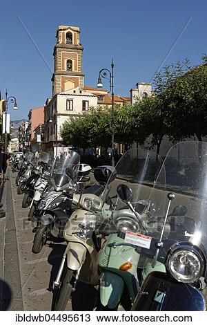 Vespas along the street with cathedral, Cattedrale dei Santi Filippo e Giacomo, Sorrento, Sorrentine Peninsula, Amalfi Coast, Campania, Italy, Europe View Large Photo Image Stock Image - Vespas along the street with cathedral, Cattedrale dei Santi Filippo e Giacomo, Sorrento, Sorrentine Peninsula, Amalfi Coast, Campania, Italy, Europe. Fotosearch