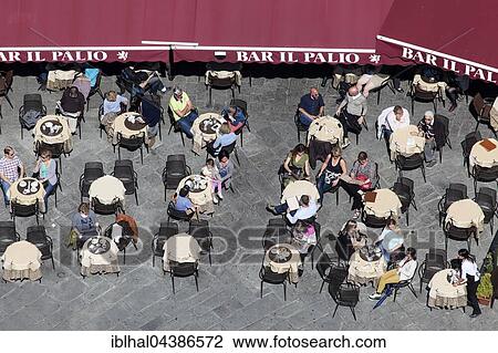 View from Torre del Mangia, tourists in cafe on Piazza del Campo, Siena, Province of Siena, Tuscany, Italy, Europe View Large Photo Image Stock Image - View from Torre del Mangia, tourists in cafe on Piazza del Campo, Siena, Province of Siena, Tuscany, Italy, Europe. Fotosearch