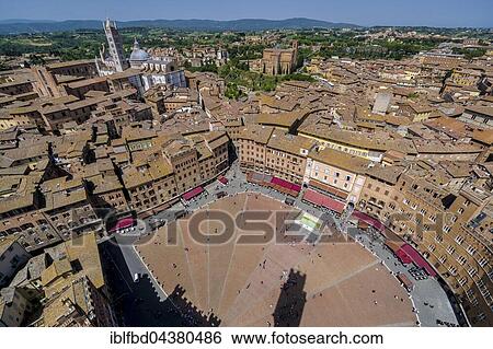 View of Piazza del Campo and city roofs from Torre del Mangia, Siena, Tuscany, Italy, Europe View Large Photo Image Stock Photograph - View of Piazza del Campo and city roofs from Torre del Mangia, Siena, Tuscany, Italy, Europe. Fotosearch