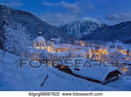 Stock Image - View of the village with the monastery at dusk, Ettal, Ettaler Sattel, Ammergau Alps nature park Park, Upper Bavaria, Bavaria, Germany, Europe. Fotosearch