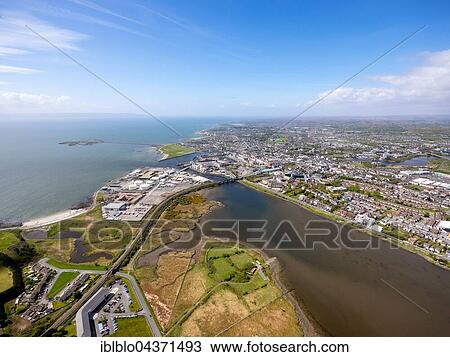 Stock Image - View of town and harbour, docks, Lough Atalia Road, Galway, County Clare, Ireland, Europe. Fotosearch