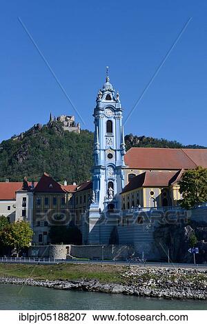 Stock Photo - View over Danube, Dürnstein with collegiate church and castle ruins, Wachau, Austria, Europe. Fotosearch