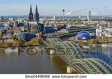 View over the river Rhine, Cologne's historic centre, Museum Ludwig, Cologne Cathedral, Hohenzollern Bridge, Central Station, Musical Dome, behind Colonius TV tower and KölnTurm, Cologne, North Rhine-Westphalia, Germany, Europe View Large Photo Image Stock Photo - View over the river Rhine, Cologne's historic centre, Museum Ludwig, Cologne Cathedral, Hohenzollern Bridge, Central Station, Musical Dome, behind Colonius TV tower and KölnTurm, Cologne, North Rhine-Westphalia, Germany, Europe. Fotosearch