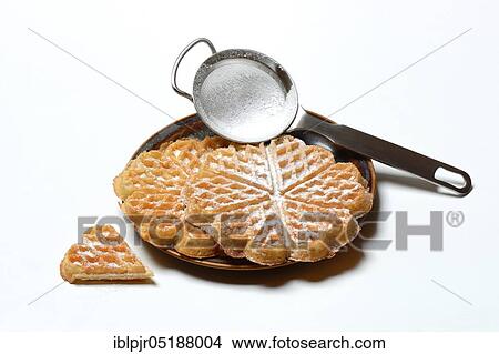 Waffle and sieve with icing sugar View Large Photo Image Picture - Waffle and sieve with icing sugar. Fotosearch