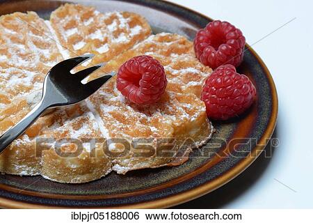 Stock Photograph - Waffle, Waffle with raspberries and fork. Fotosearch