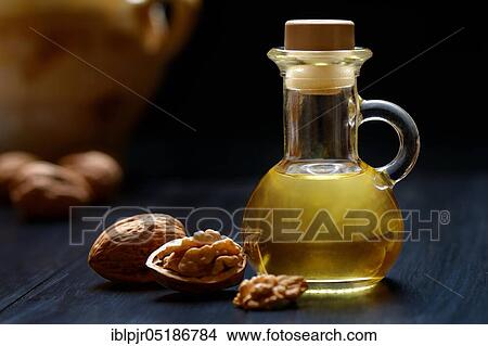 Walnut oil and walnuts ( Juglans regia) View Large Photo Image Picture - Walnut oil and walnuts ( Juglans regia). Fotosearch
