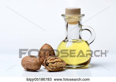 Walnut oil and walnuts ( Juglans regia) View Large Photo Image Stock Image - Walnut oil and walnuts ( Juglans regia). Fotosearch