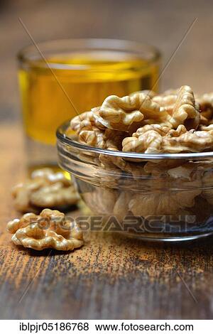 Walnuts ( Juglans regia) in shell and walnut oil View Large Photo Image Stock Photo - Walnuts ( Juglans regia) in shell and walnut oil. Fotosearch