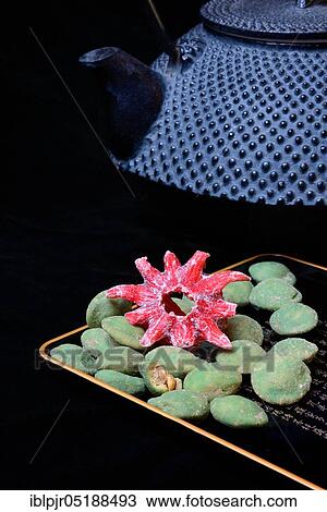 Wasabi peanuts and candied hibiscus flower, shell with Japanese characters, wasabi coat View Large Photo Image Stock Image - Wasabi peanuts and candied hibiscus flower, shell with Japanese characters, wasabi coat. Fotosearch