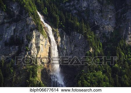 Waterfall in Bernese Alps, Switzerland, Europe View Large Photo Image Picture - Waterfall in Bernese Alps, Switzerland, Europe. Fotosearch