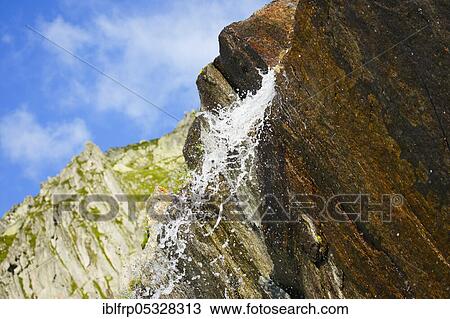Stock Image - Waterfall on the Gotthard Pass, Ticino, Switzerland, Europe. Fotosearch