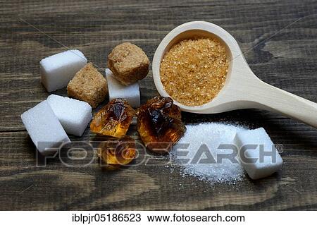 White and brown sugar, beet sugar, cane sugar, candy sugar, sugar cubes, granulated sugar View Large Photo Image Stock Image - White and brown sugar, beet sugar, cane sugar, candy sugar, sugar cubes, granulated sugar. Fotosearch