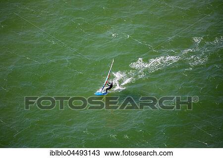 Windsurfer, in front of peninsula Mönchgut, Rügen, Baltic coast, Mecklenburg-Western Pomerania, Germany, Europe View Large Photo Image Stock Image - Windsurfer, in front of peninsula Mönchgut, Rügen, Baltic coast, Mecklenburg-Western Pomerania, Germany, Europe. Fotosearch