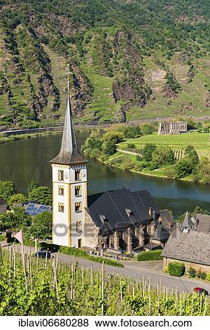 Stock Photo - Wiwing village Bremm at the Moselle with St. Laurentius church, in the back the monastery ruin Stuben, Bremm, Rhineland-Palatinate, Germany, Europe. Fotosearch