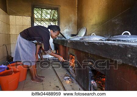 Woman in school kitchen, Fianarantsoa province, Madagascar, Africa View Large Photo Image Stock Photo - Woman in school kitchen, Fianarantsoa province, Madagascar, Africa. Fotosearch