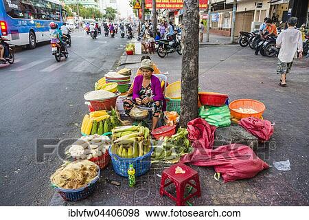 Woman selling vegetables by the roadside, Ho Chi Minh City, Ho Chi Minh City, Vietnam, Asia View Large Photo Image Stock Photo - Woman selling vegetables by the roadside, Ho Chi Minh City, Ho Chi Minh City, Vietnam, Asia. Fotosearch