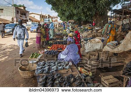Women selling local goods, market, street scene, Foumban, West Region, Cameroon, Africa View Large Photo Image Stock Image - Women selling local goods, market, street scene, Foumban, West Region, Cameroon, Africa. Fotosearch