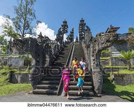 Young Balinese women descend stairs, Mother Temple, Besakih temple, Pura Agung Besakih Penetaran, Bali-Hinduism, Banjar Besakih, Bali, Indonesia, Asia View Large Photo Image Stock Image - Young Balinese women descend stairs, Mother Temple, Besakih temple, Pura Agung Besakih Penetaran, Bali-Hinduism, Banjar Besakih, Bali, Indonesia, Asia. Fotosearch