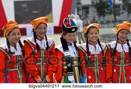Stock Image - Young girls in traditional Deel clothes, Festival of the Mongolian national costume, Ulaanbaatar, Mongolia, Asia. Fotosearch