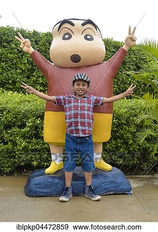 Stock Photo - Young imitating with a cartoon figure, Phnom Penh Province, Cambodia, Asia. Fotosearch