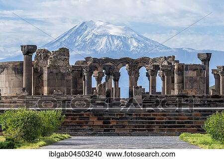 Stock Image - Zvarnots ruins, Zwartnots temple or St Gregory Cathedral, Mount Ararat in Turkey behind, Yerevan, Armavir Province, Armenia, Asia. Fotosearch