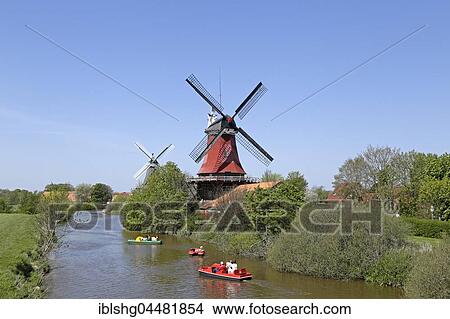 Zwillingsmühlen, Greetsiel, Krummhörn, East Frisia, Lower Saxony, Germany, Europe View Large Photo Image Picture - Zwillingsmühlen, Greetsiel, Krummhörn, East Frisia, Lower Saxony, Germany, Europe. Fotosearch