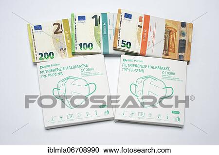 2 packs FFP 2 masks in front of 200, 100, 50 € banknote bundles, corruption, Bavaria, Germany, Europe View Large Photo Image Stock Image - 2 packs FFP 2 masks in front of 200, 100, 50 € banknote bundles, corruption, Bavaria, Germany, Europe. Fotosearch